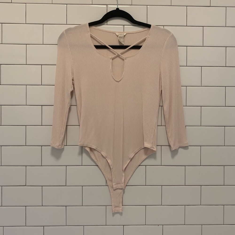 Forever 21 bodysuit. No tags, but never worn.